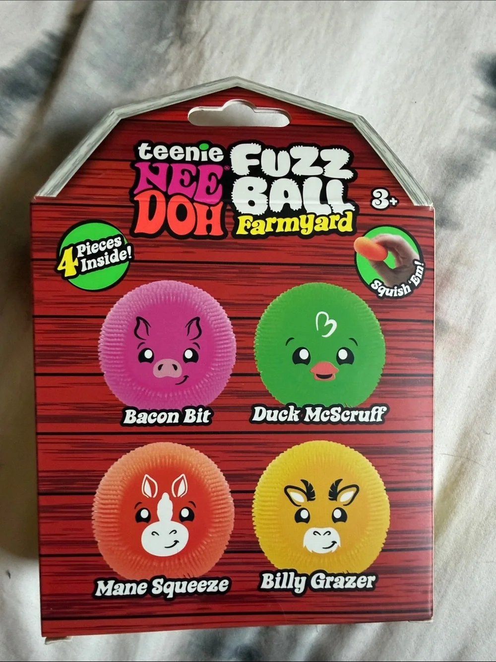 teenie NEE DOO Fuzz Ball Squishy Toy Set - Pink, Green, Red, Yellow